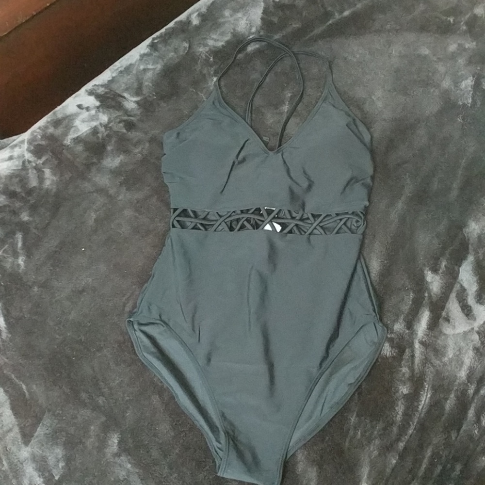 Sweet black one piece bathing suit.